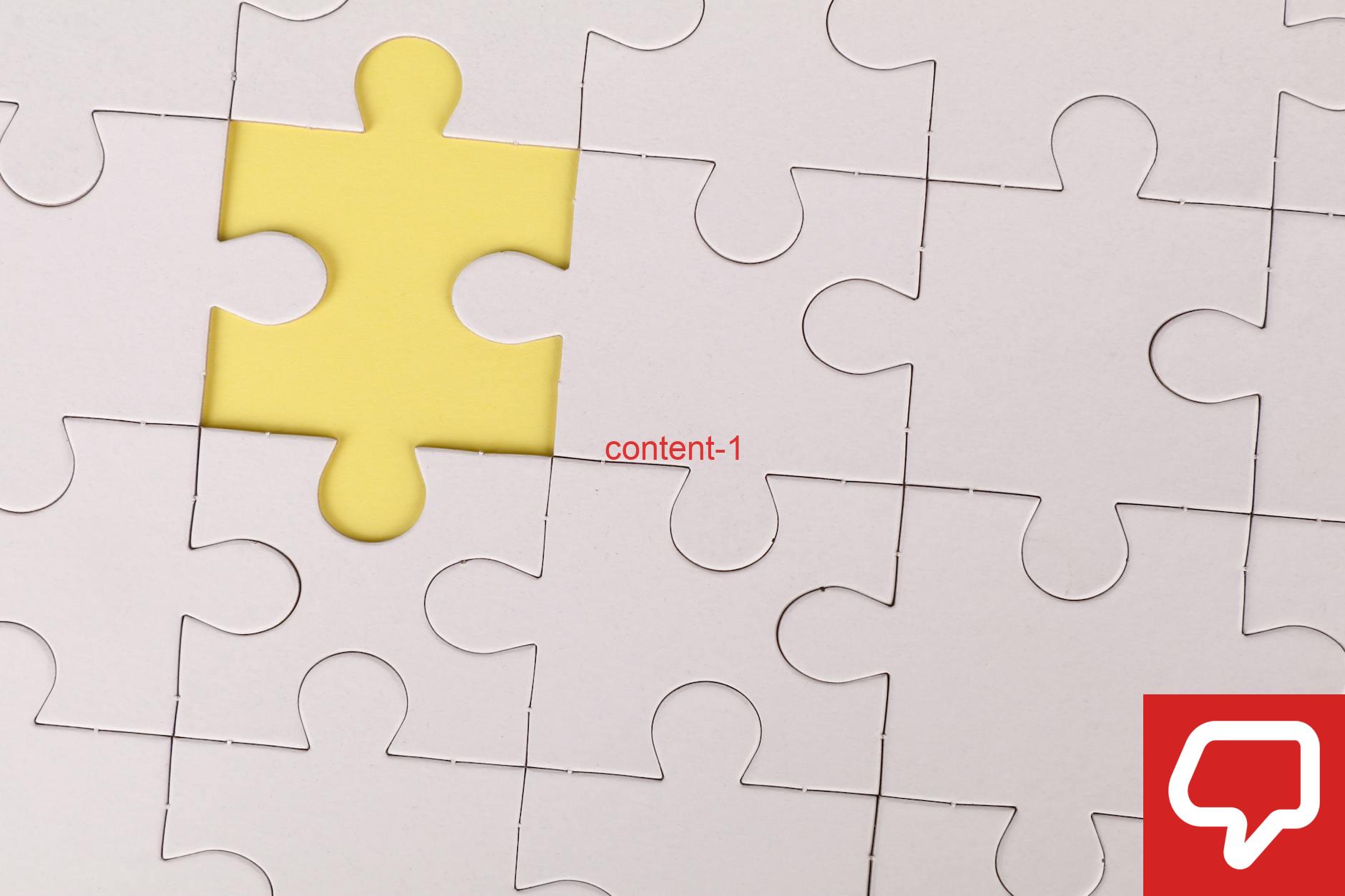 Close-up of a white jigsaw puzzle with a single yellow piece missing, symbolizing incompleteness.